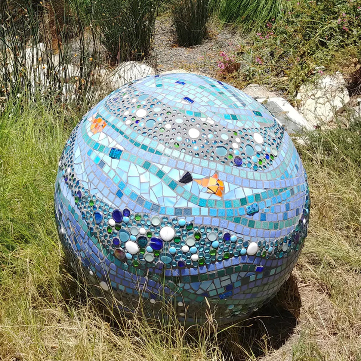Mosaic Garden Sphere with aquatic motifs at Crest Apartments