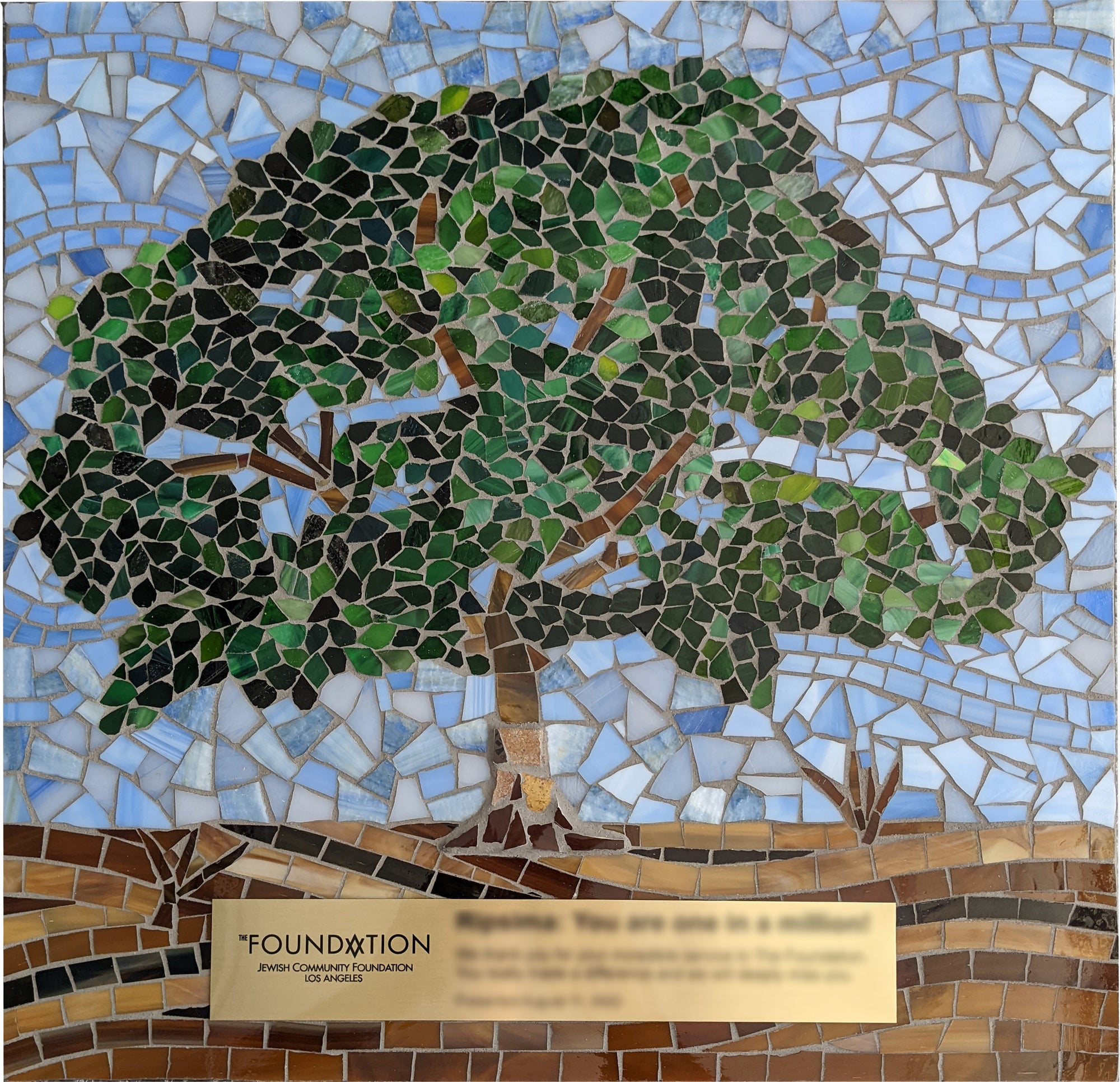 Mosaic award commissioned by the Jewish Community Foundation Los Angeles of a tree with blue background