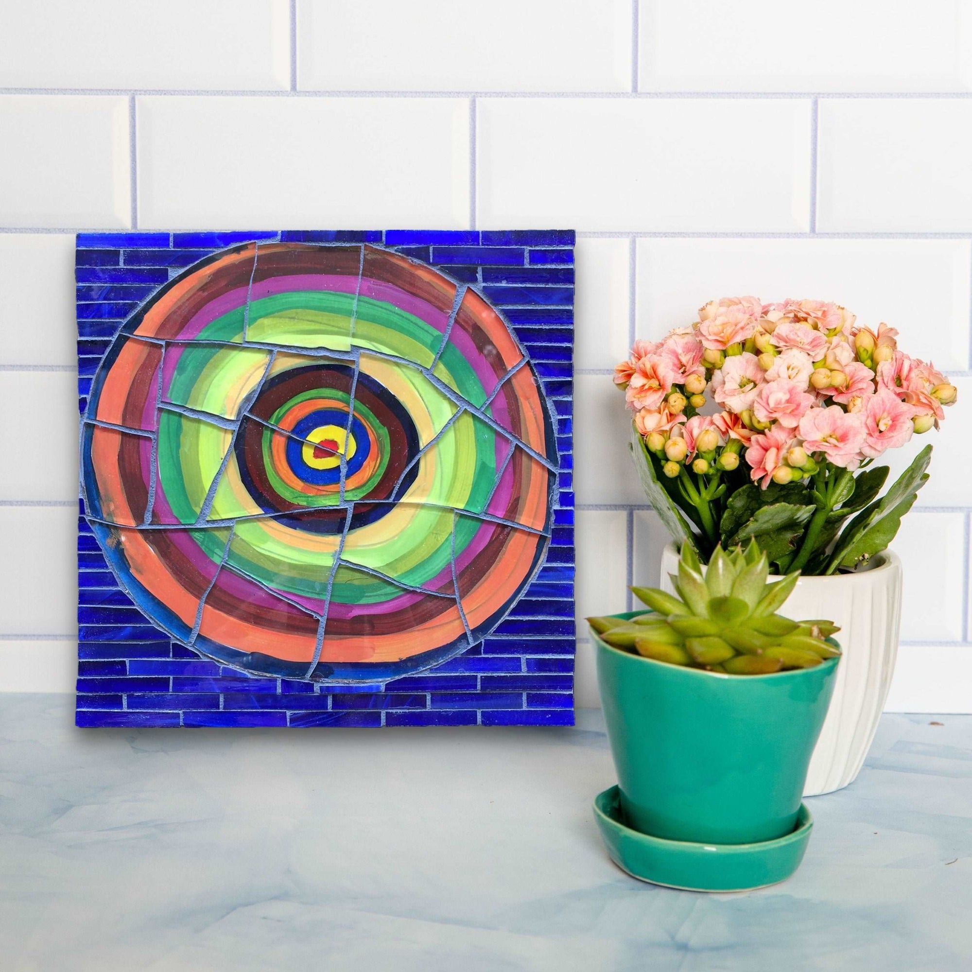 Colorful bullseye design with blue background.