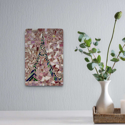 Green and pink mosaic "A" with a varied pink background.