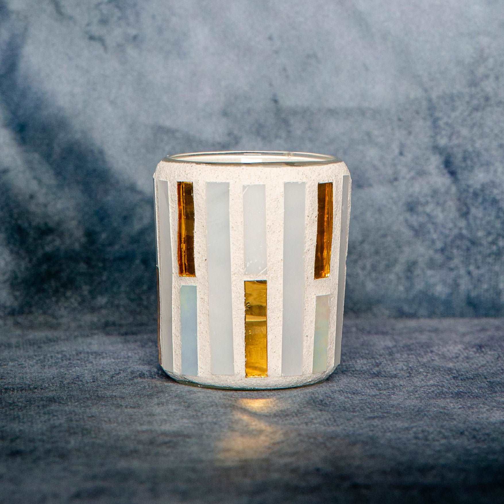 White and gold vertical line mosaic votive.