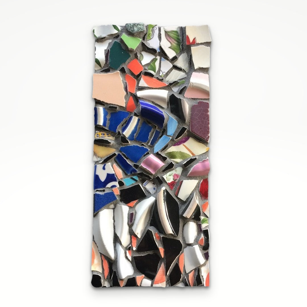 A symphony of blues, pinks, and greens from recycled ceramics come together to form this abstract mosaic. 